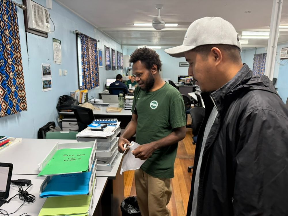Sprint Networks engineer working with local staff